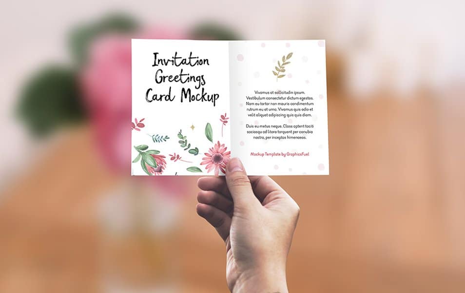 Invitation / Greeting Card in Hand Mockup PSD