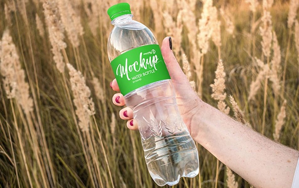 Download Free Water Bottle In Hand PSD MockUp In 4k » CSS Author