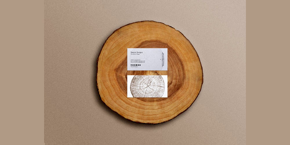 Business card mockup on wooden stump