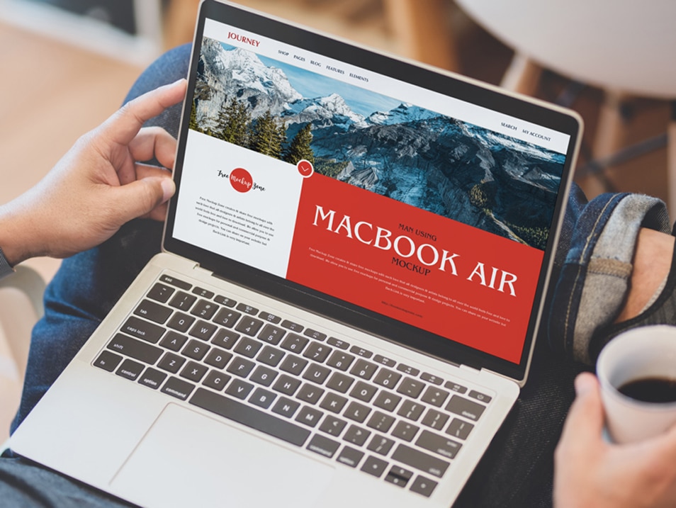 Free Man Using MacBook Air Mockup » CSS Author